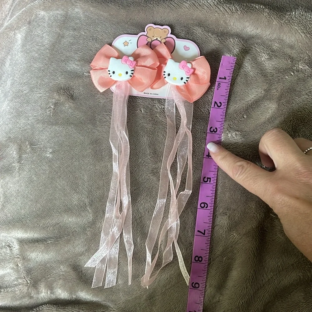 Hello Kitty Peach Hair Bows set of two with streaming ribbons NWT
